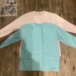 Butter-soft Scrub Jackets. Light Pink and Baby Blue. Size Small.